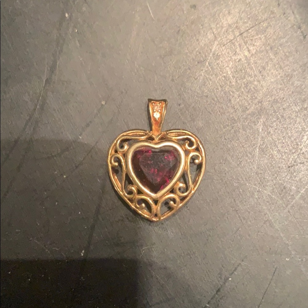 garnet with a tiny diamond in the middle